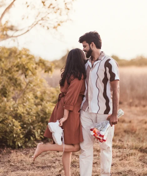Candid pre-wedding photography in Gurgaon capturing couple laughter