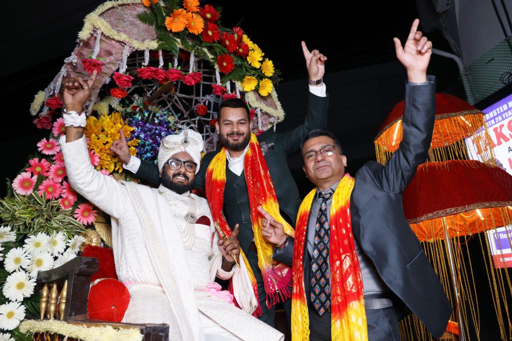 wedding photography team near me discussing shoot details