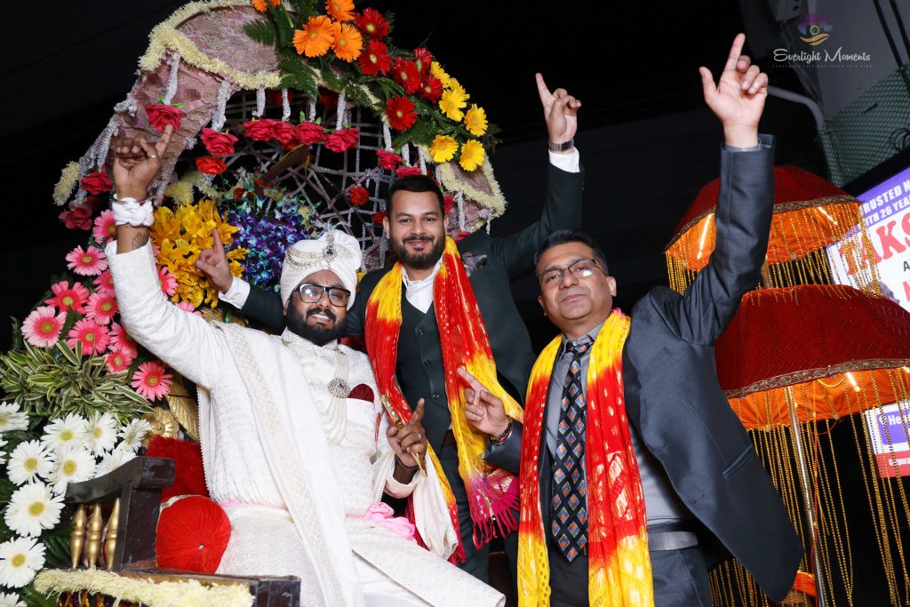 Elegant wedding decor and couple entry photographed by experienced Delhi NCR wedding photographers.